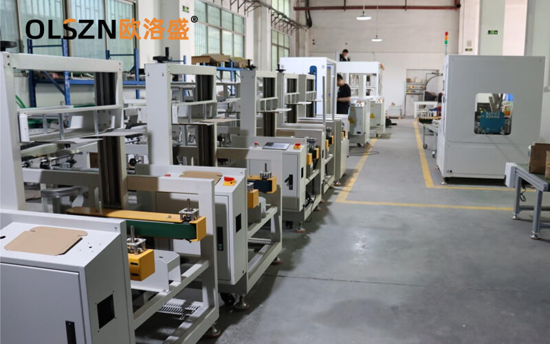 歐洛盛開(kāi)箱機(jī)、裝箱機(jī)生產(chǎn)車(chē)間一角